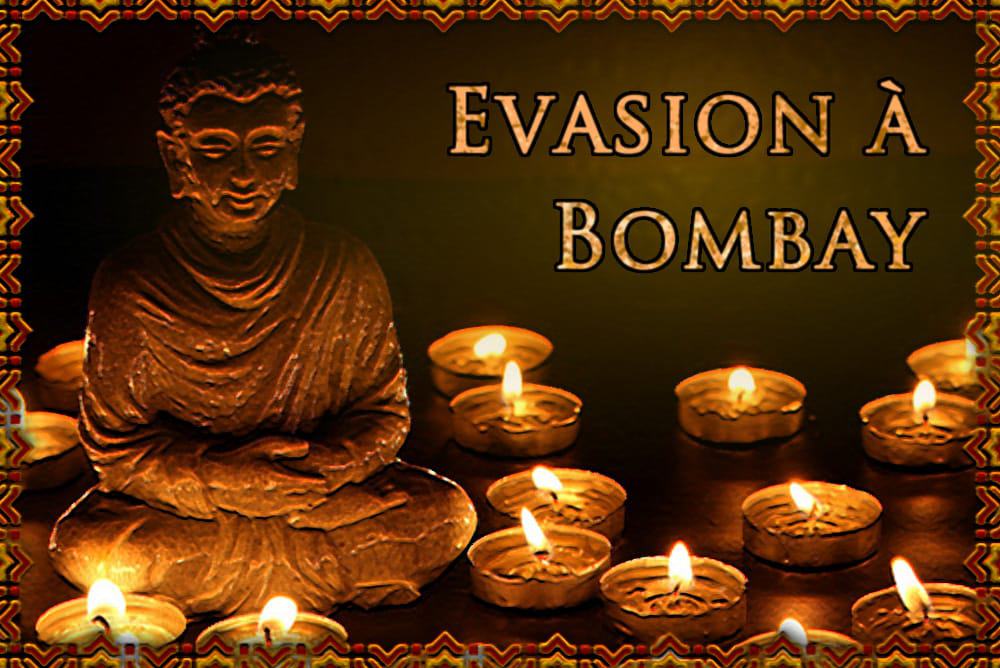 Statuette dorée de Bouddha entourée de bougies allumées dans la salle Evasion à Bombay