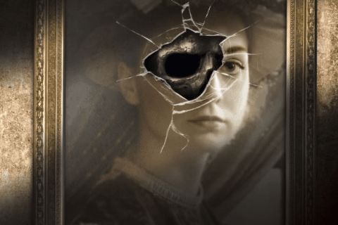 Affiche The Haunting of Worthington House : visage de femme dans un cadre doré, salle chez MindQuest Escape Games