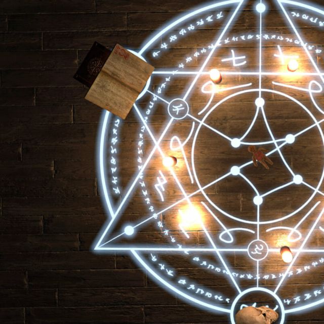 Cercle magique lumineux avec étoile et bougies sur un sol sombre, jeu House of Fear Cursed Souls chez Inoui VR à Lille