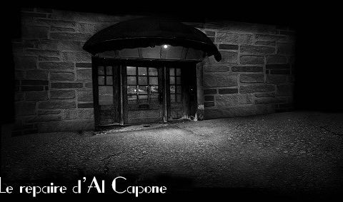 Devanture sombre d'un bâtiment de pierre la nuit, chez Enigma Run à Saint-Denis