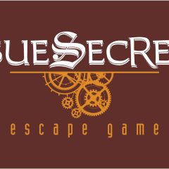 Logo d'Issue Secrète, escape game à Anthy-sur-Léman, avec engrenages dorés