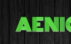 Logo d'Aenigma, escape game à La Garde, texte vert sur fond noir