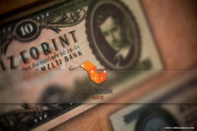 Logo de Fox in a box, escape game à Nice, avec billet de banque en gros plan
