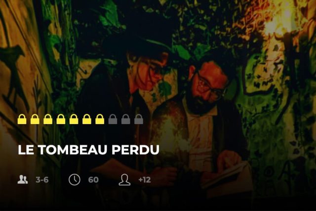 Deux joueurs penchés sur des notes dans une salle de jungle, mention Le tombeau perdu avec cadenas jaunes, Freeing à Saint-Maximin