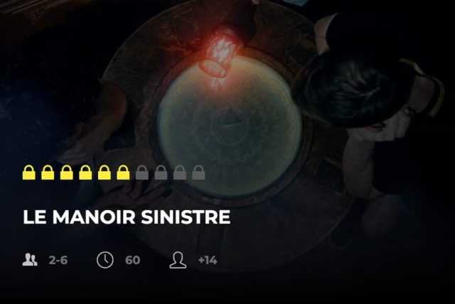 Sphère translucide éclairée de rouge, cadenas jaunes de difficulté, mention Le manoir sinistre, Freeing à Saint-Maximin