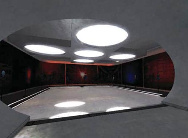 Pièce futuriste à plafond de grands disques lumineux, décor de la salle Revanche à Roswell chez E-Scape Project à Dieppe