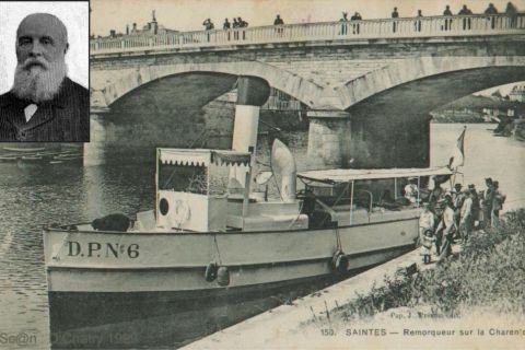 Remorqueur fluvial D.P.N°6 sous pont de pierre, passagers à quai à Saintes
