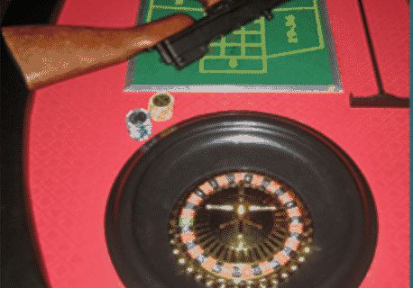 Table de roulette rouge, carabine posée au-dessus, titre La prison du casino, salle chez Xcape Room à Montpellier