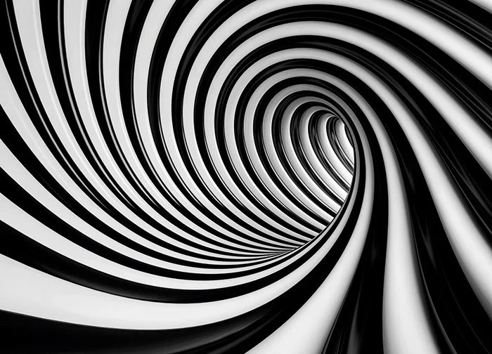 Tunnel spiralé en noir et blanc, perspective vertigineuse vers l'infini dans Un monde sans couleurs